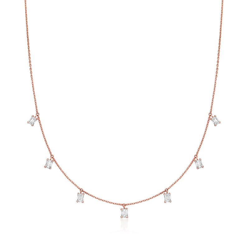 18kt rose gold diamond station necklace with small square-cut diamonds along the chain
