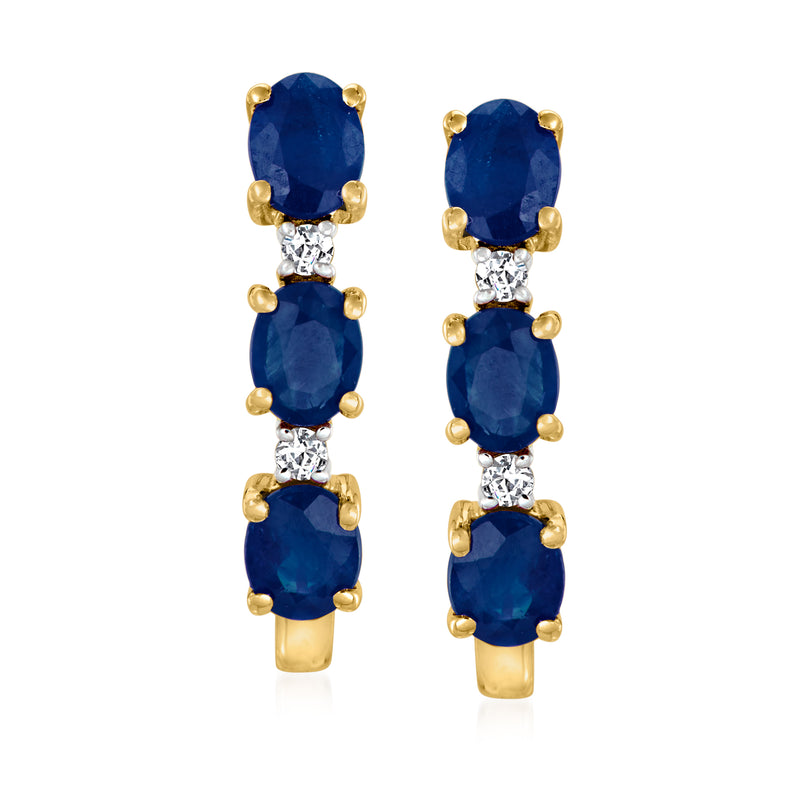 14kt yellow gold hoop earrings with three blue sapphires and small diamond stones