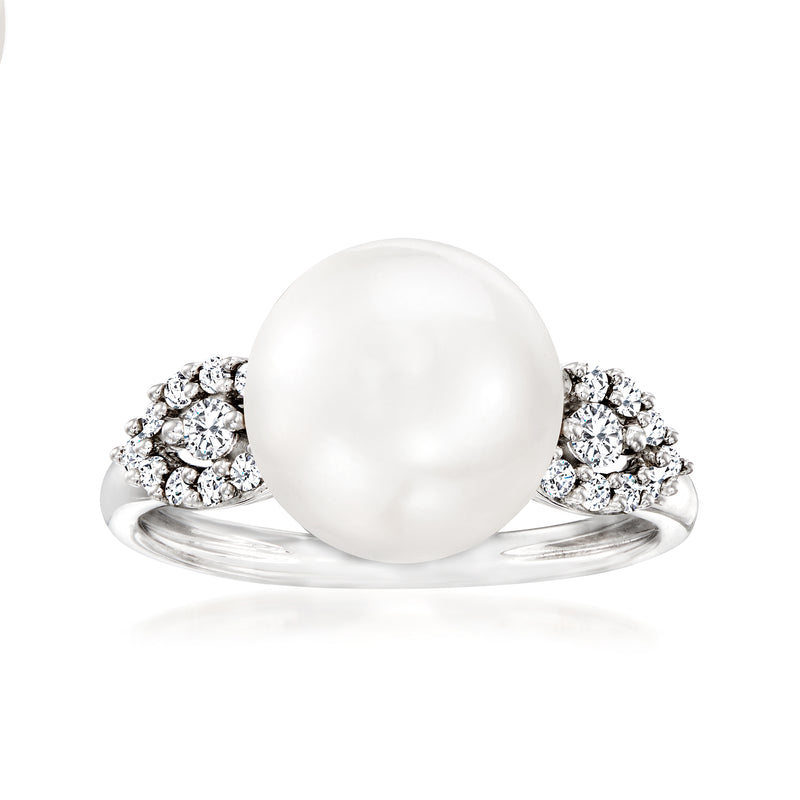 14kt white gold ring with large white cultured pearl and diamond halo clusters