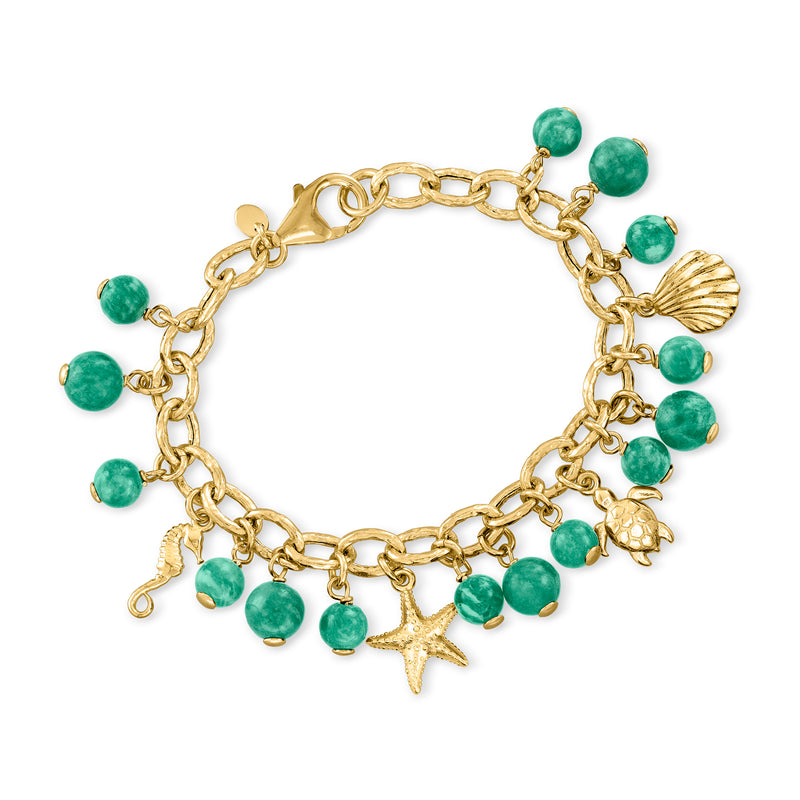 Gold over sterling sea life charm bracelet with green beads, starfish, shell and lobster charms