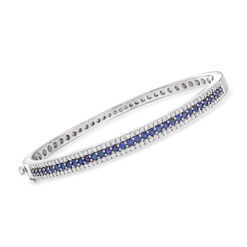 Sterling silver bangle bracelet with blue sapphire and diamond rows along the center