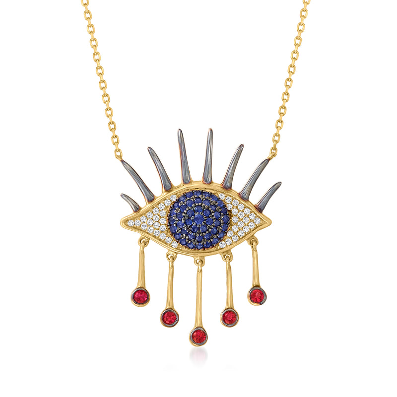 Evil eye necklace in 14kt yellow gold with sapphire blue center, diamond halo, ruby drops