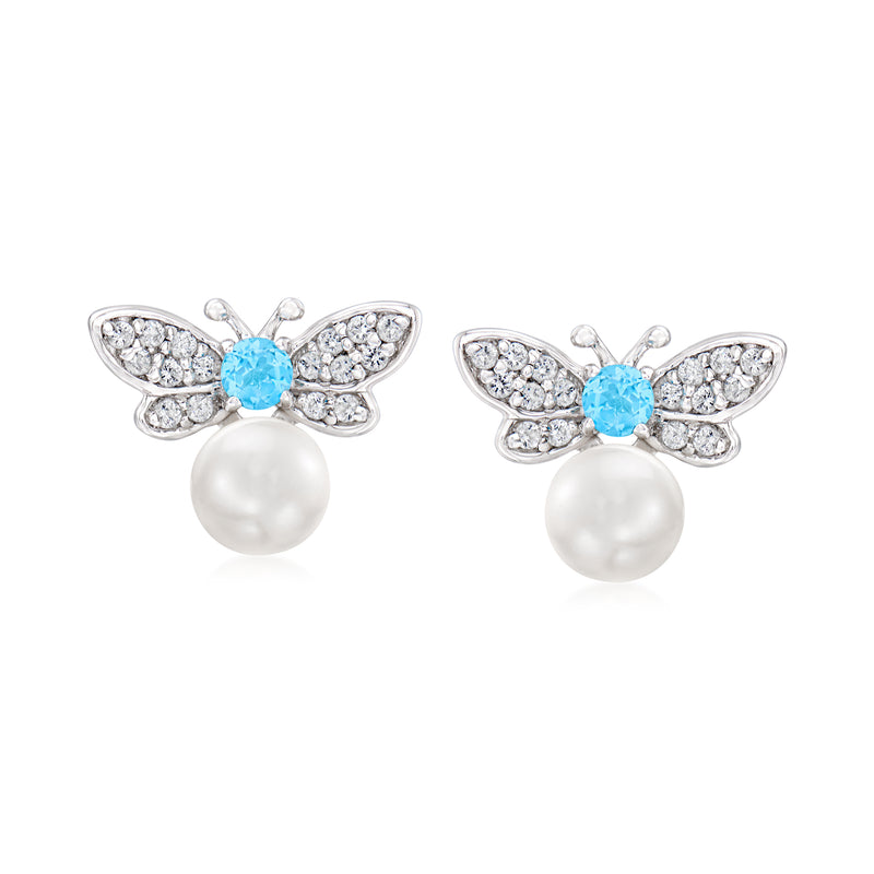 Sterling silver butterfly stud earrings with blue topaz, white stones, and pearl drops