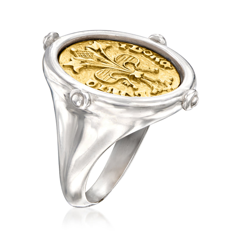 Two-tone coin-style sterling silver ring with oval gold medallion inset, side view