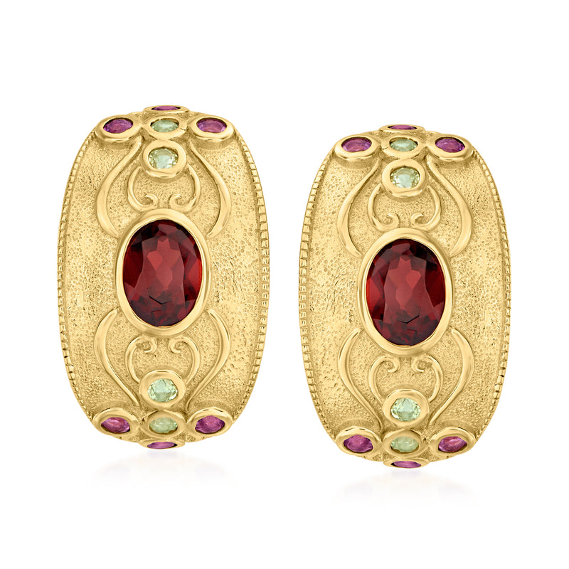 Gold-tone drop earrings with oval red center gem and purple and green side accents