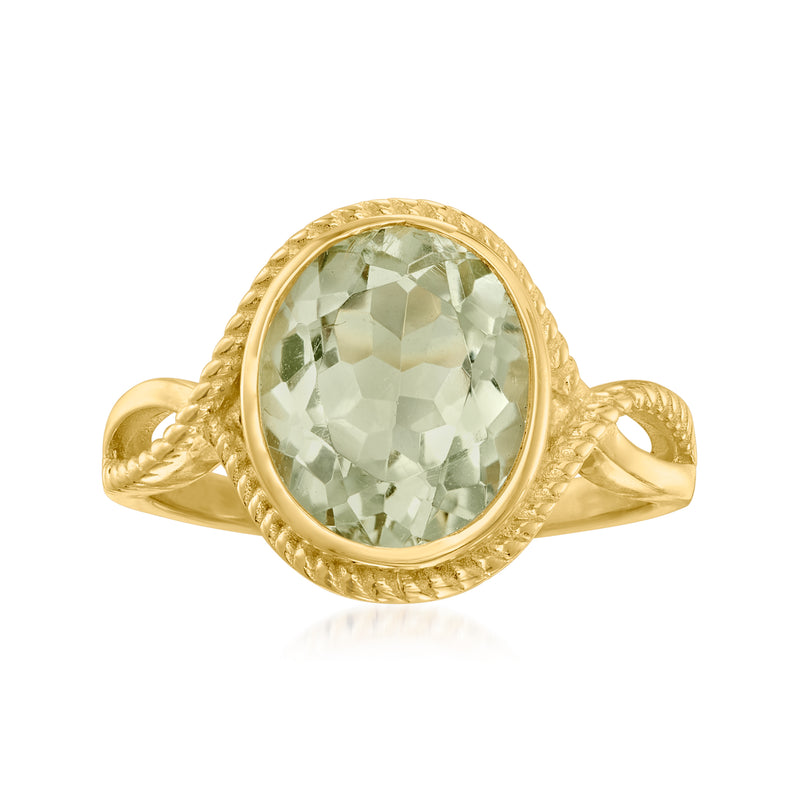 Oval light-green gemstone ring in gold with braided bezel and rope design