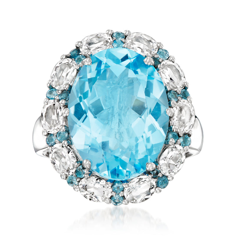 Sterling silver ring with large oval Swiss blue topaz and clear stone halo