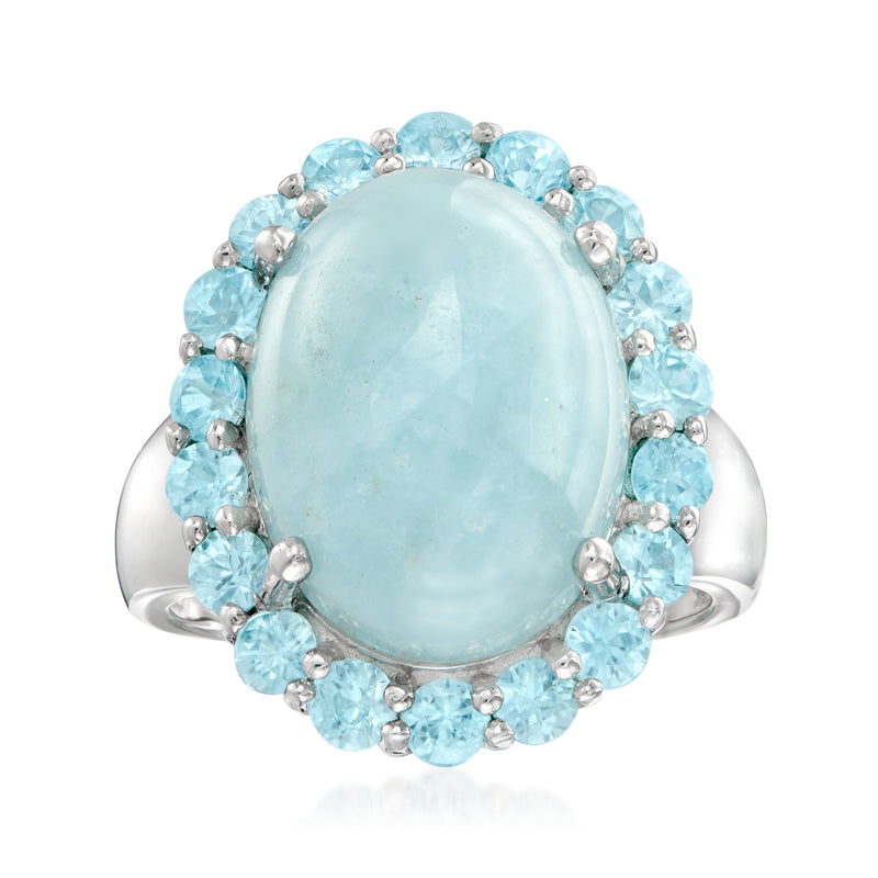Sterling silver aquamarine ring with oval center stone and blue zircon halo