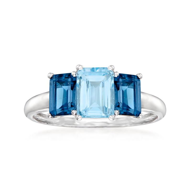 Sterling silver ring with three blue topaz: center emerald-cut