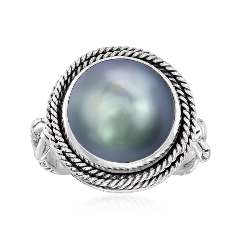 Sterling silver ring with dark mabe pearl and braided rope bezel