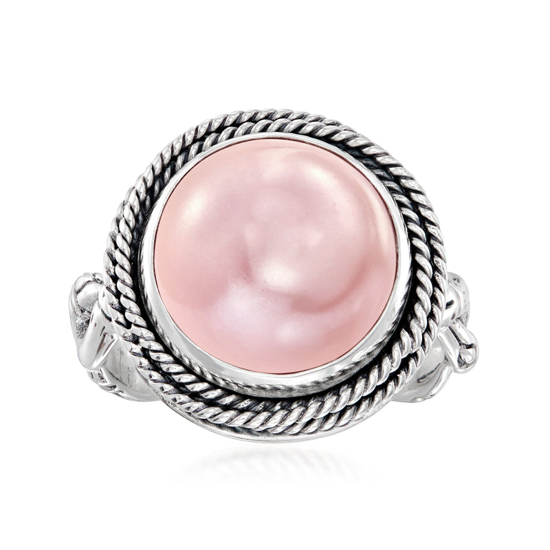 Sterling silver Bali-style ring with pink mabe pearl center and rope twist border