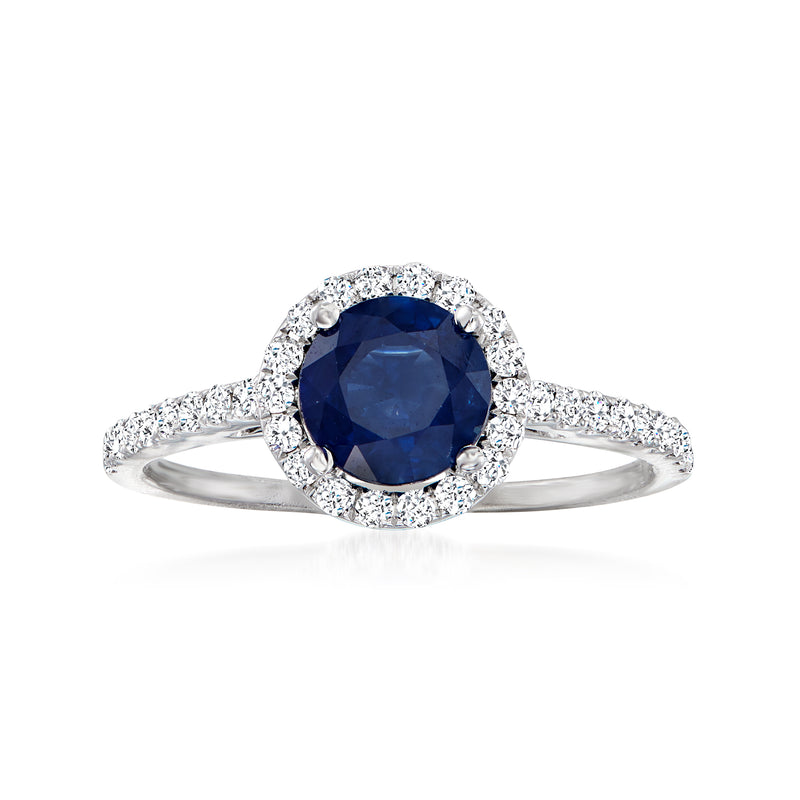 18k white gold sapphire and diamond halo ring with oval center stone