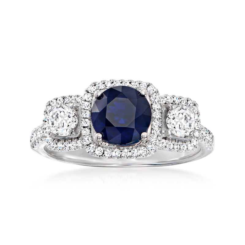 18kt white gold halo ring with cushion blue sapphire center and diamond side stones
