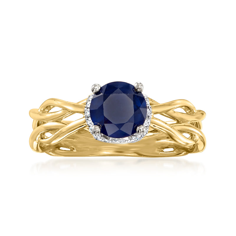 Two-tone gold ring with dark blue oval sapphire, diamond halo, braided split shank
