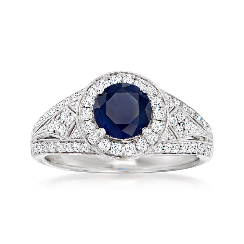 Sapphire and diamond halo ring in white gold with split-shank band