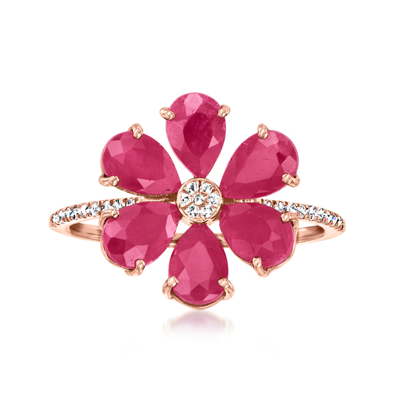 14kt rose gold flower ring with five pink oval rubies and round diamond center