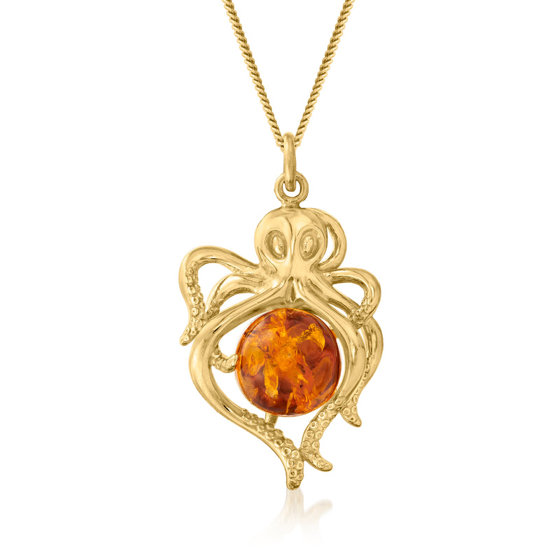 Amber octopus pendant necklace in gold tone with round amber cabochon