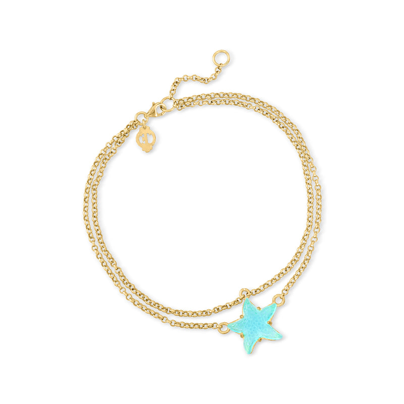 Gold-tone starfish anklet with light blue glass star charm on chain