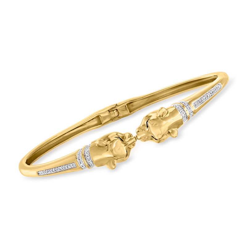 Gold-tone diamond bangle bracelet with double panther head and sparkling white stone details