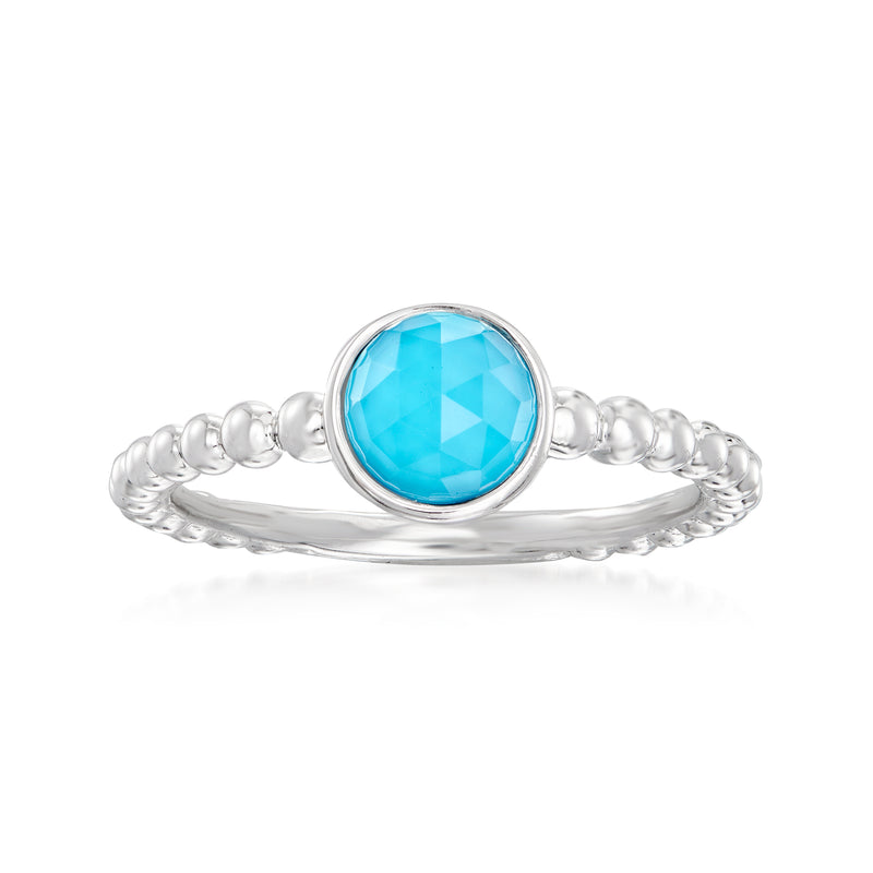 Sterling silver ring with round turquoise blue gemstone
