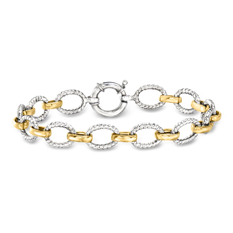 Two-tone sterling silver oval-link bracelet with gold accents and circular clasp