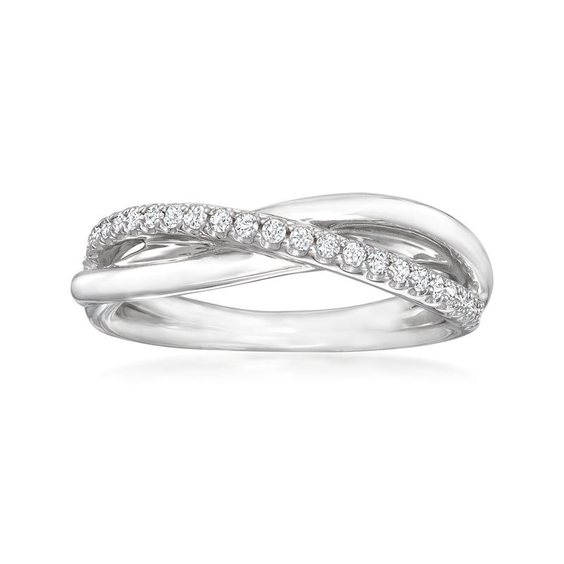 Sterling silver crisscross ring with round white stones in a curved channel