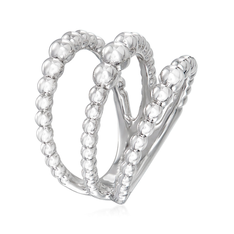 Sterling silver open-row ring with rounded ball accents, angled view