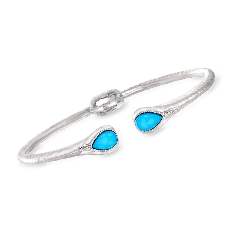 Sterling silver cuff bracelet with two turquoise teardrop stones and hinged doublet design