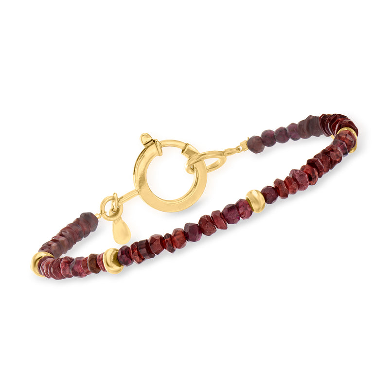 Garnet bead bracelet with gold clasp and dark red round beads.