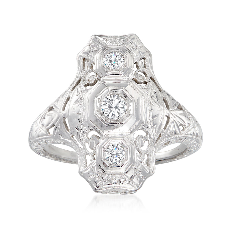 Vintage filigree dinner ring in white gold with three octagonal diamond settings