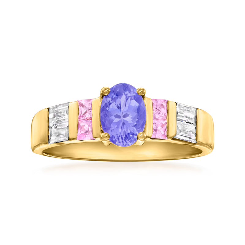 14kt yellow gold ring with oval tanzanite, pink sapphires, and diamond baguettes
