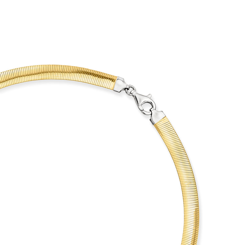 Gold-tone omega necklace clasp detail with reversible toggle hardware