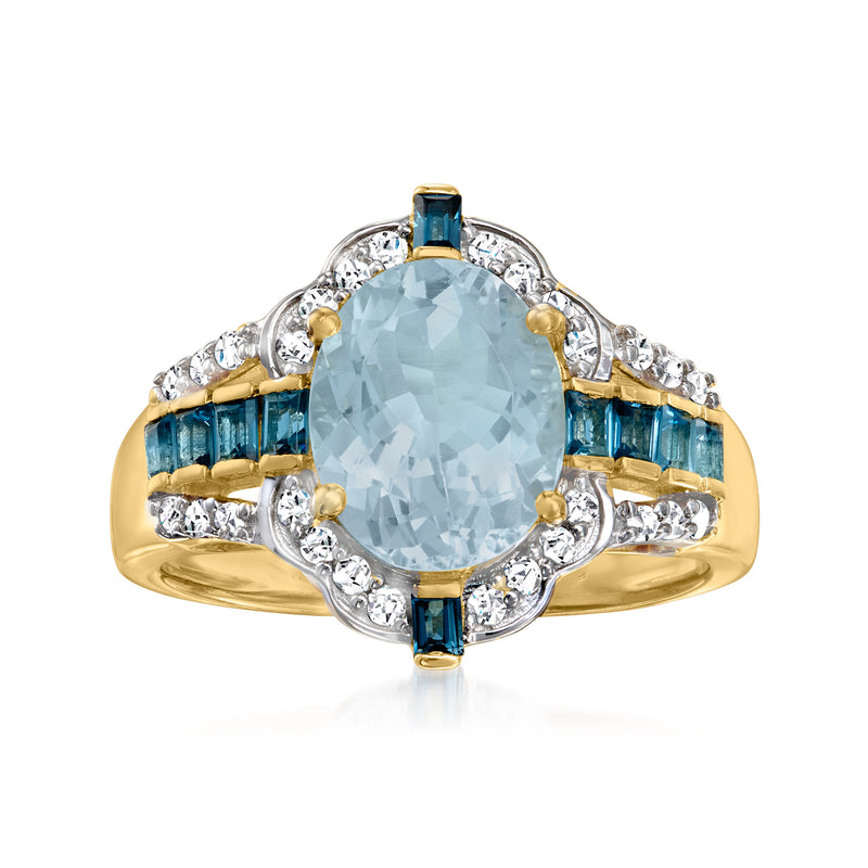 18kt gold over sterling ring, oval aquamarine center, blue side stones, white zircon halo