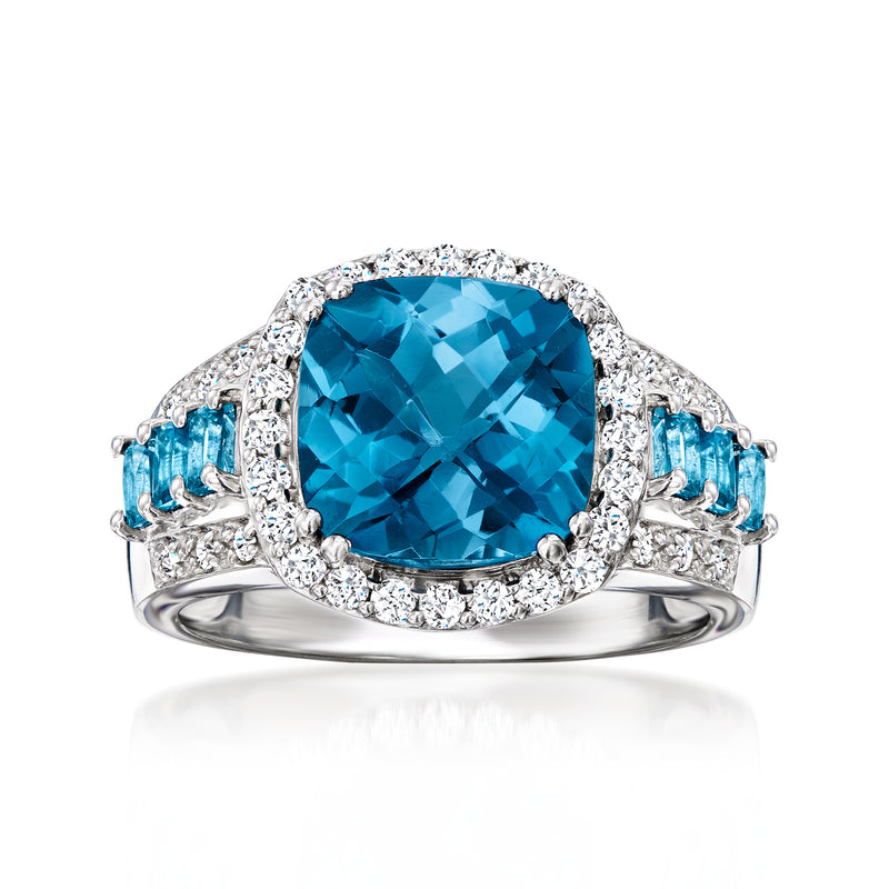 Sterling silver oval London blue topaz ring with white gemstone halo and side stones