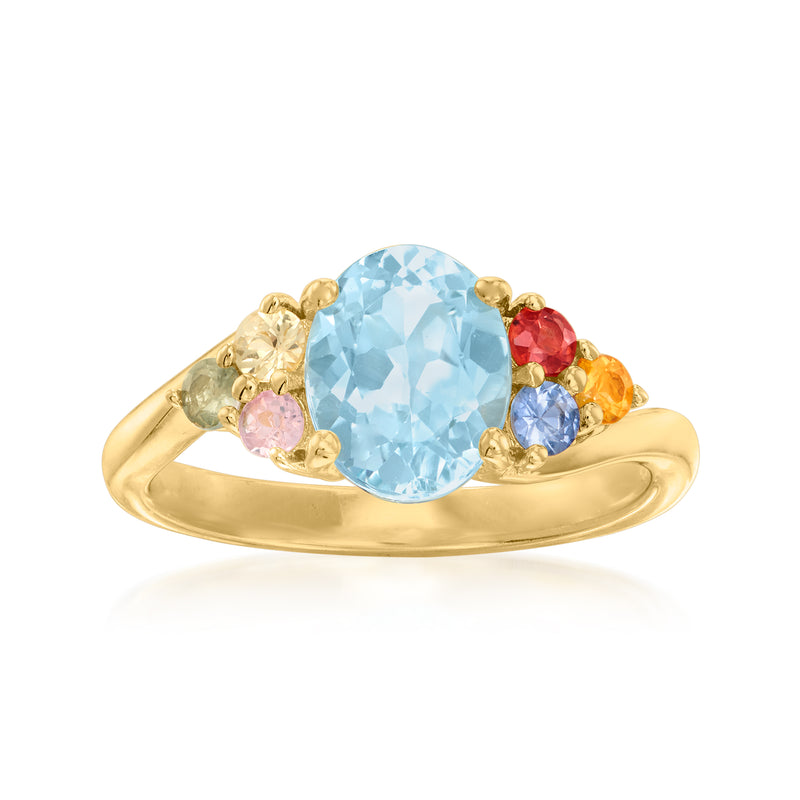 Gold over sterling ring with oval sky blue topaz and multicolor sapphire accents