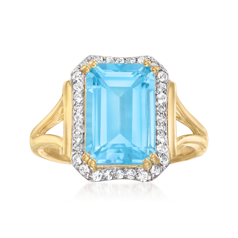 18kt gold over sterling ring with rectangular sky blue topaz center and white topaz halo