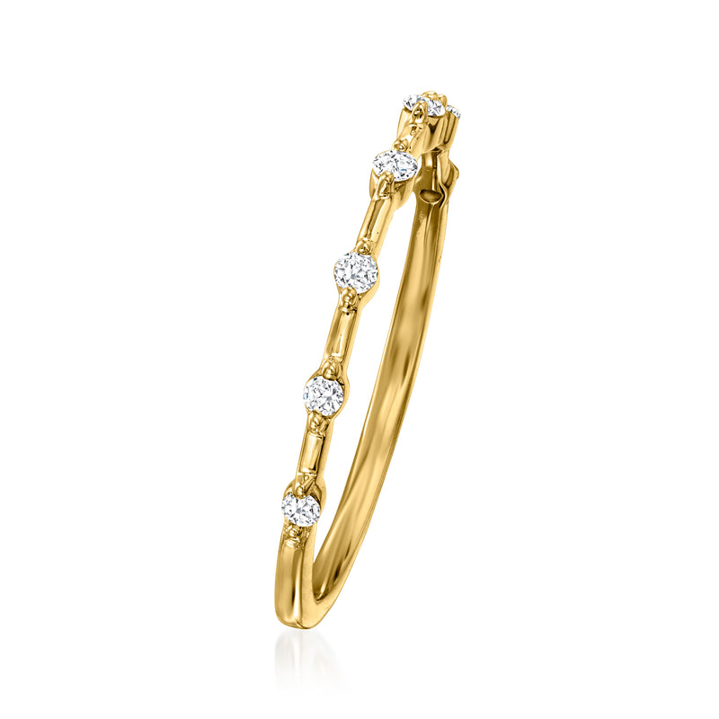 14kt yellow gold diamond station ring, side view with round stones along the band