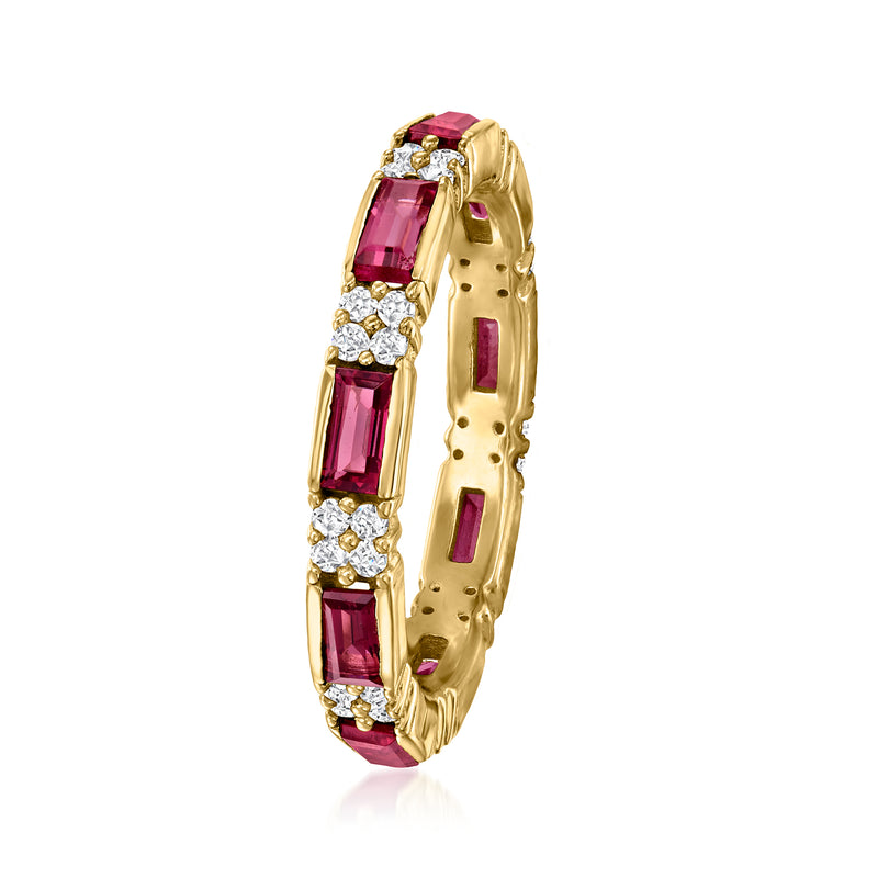 Gold eternity band ring with pink rectangular stones and white round gems along the side