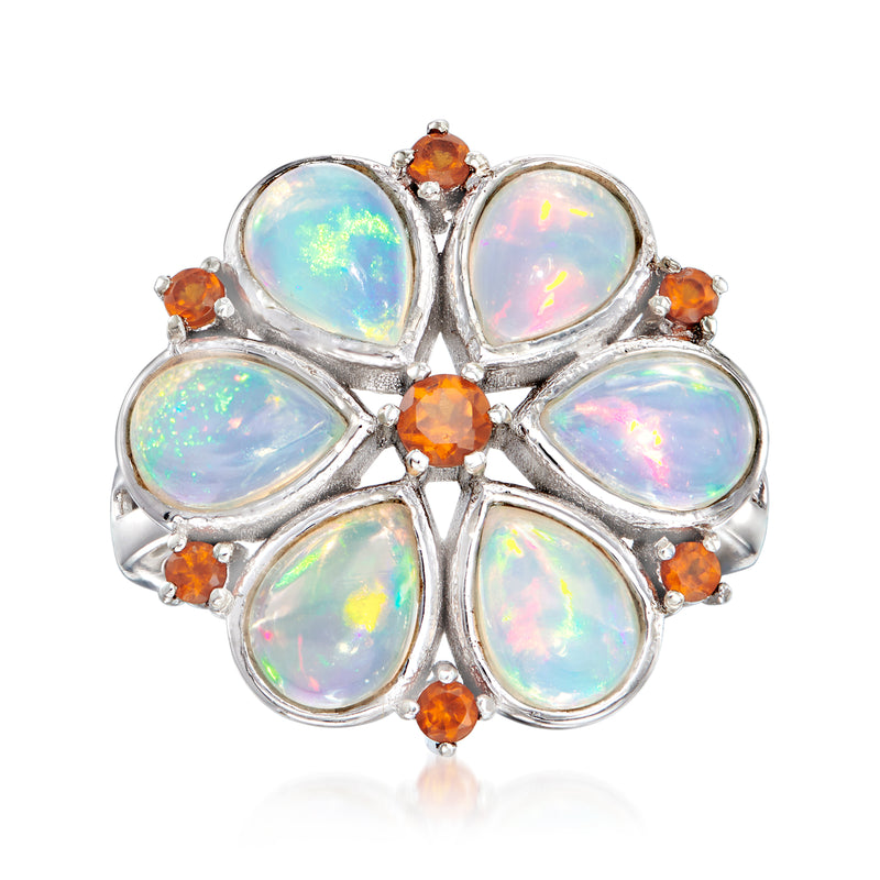 Sterling silver ring with six oval opal cabochons and orange round gemstones