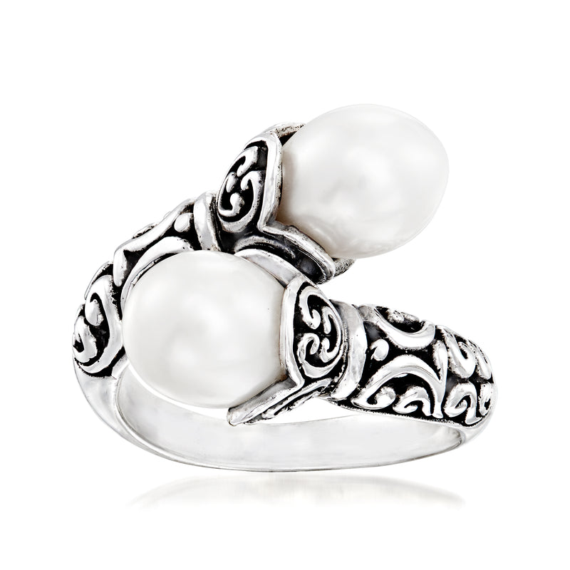 Sterling silver bypass ring with two white cultured pearls and ornate Bali-style filigree