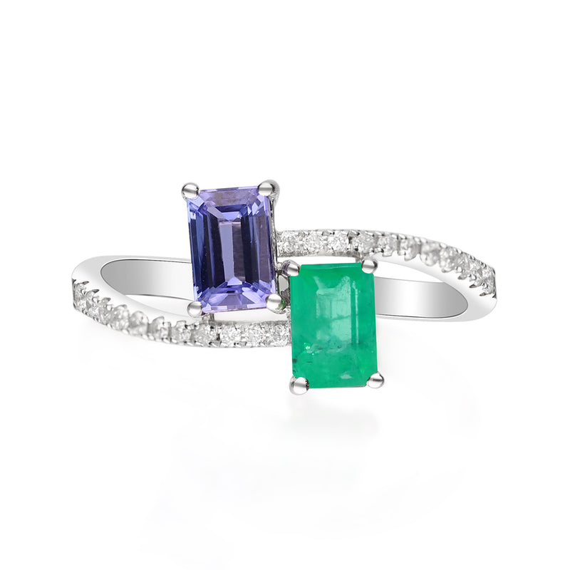 Bypass ring in 18kt white gold with emerald-cut green and blue gemstones, diamond accents