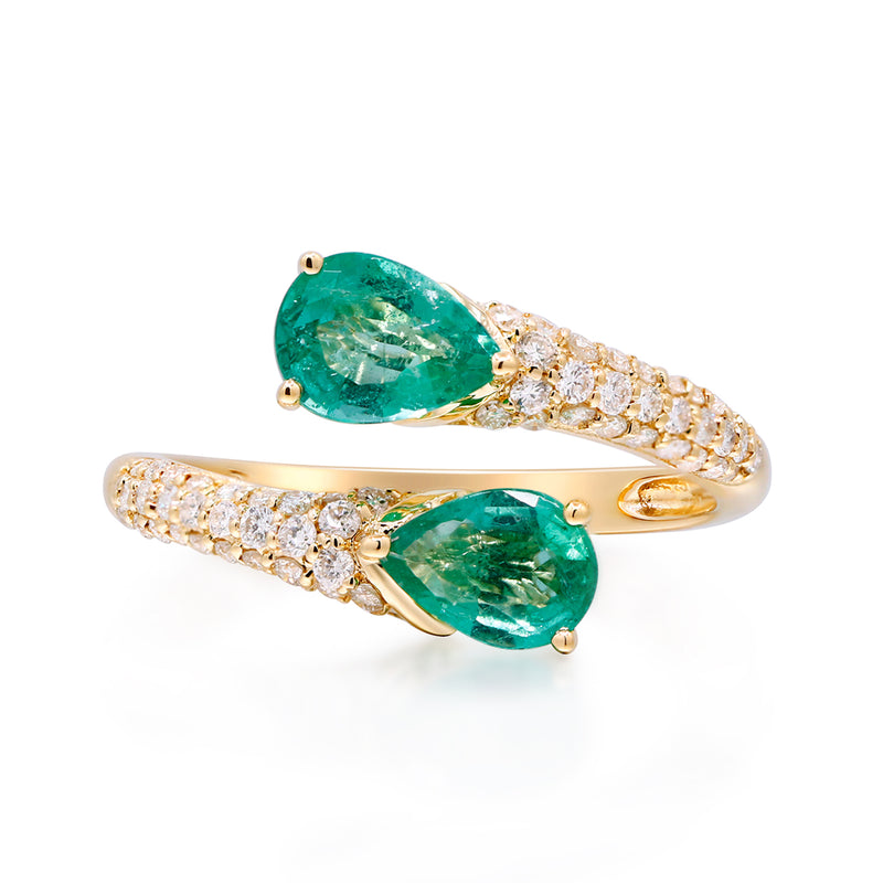 14kt yellow gold emerald and diamond bypass ring with green pear center stones and diamond pave