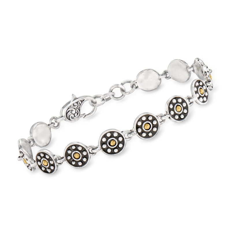 Sterling silver Bali-style circle bracelet with round linked discs and gold-tone inlays