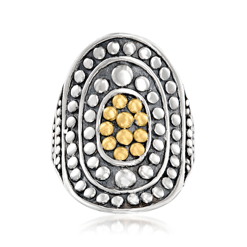Oval sterling silver ring with yellow-gold bead mosaic center and raised dot border