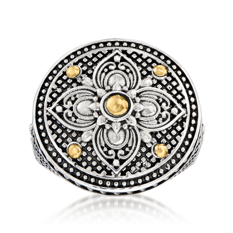 Floral design silver ring with round yellow-gold center accents and engraved border details