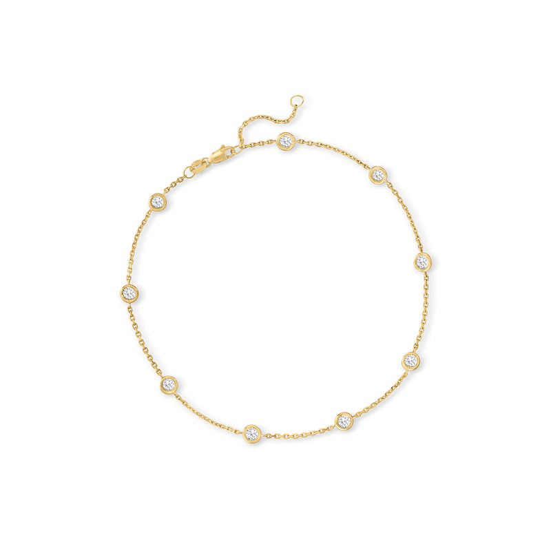 14kt yellow gold diamond station anklet with round bezel-set stones