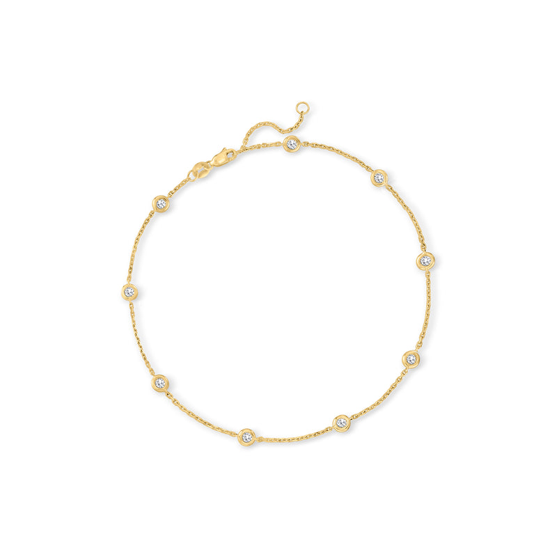 14kt yellow gold diamond station anklet with small round prong-set stones