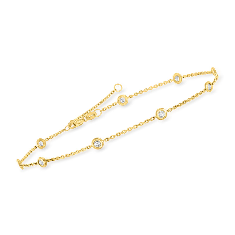 14kt yellow gold diamond station anklet with round stones on a linked chain
