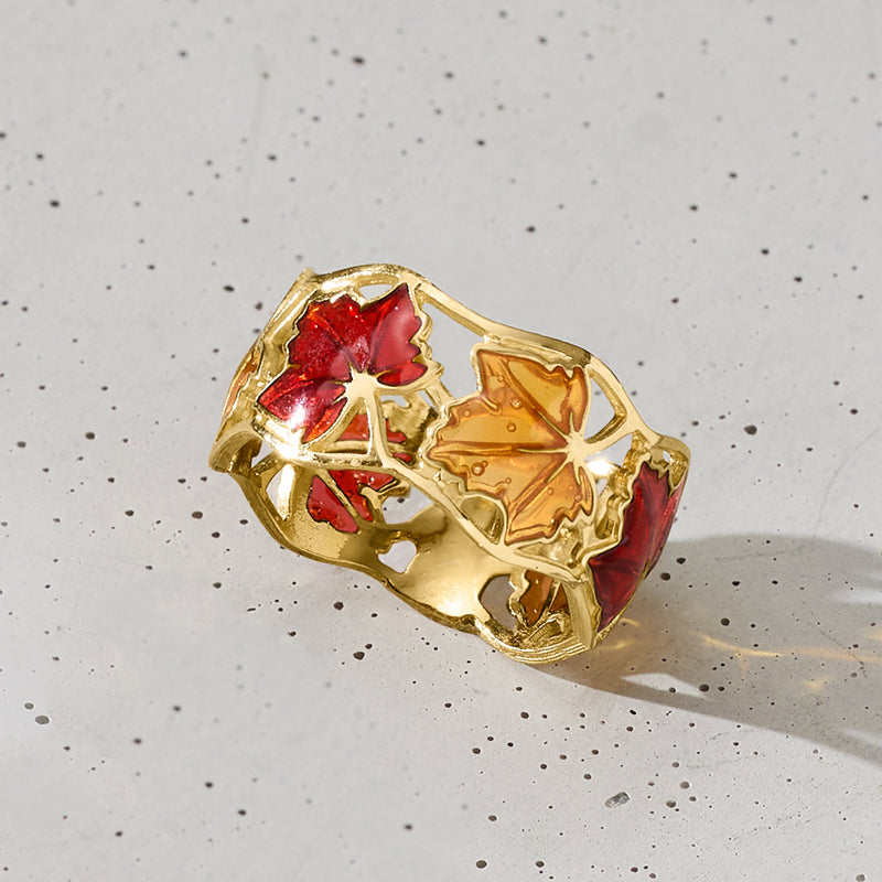 14kt yellow gold leaf ring with red and yellow enamel leaves, angled view