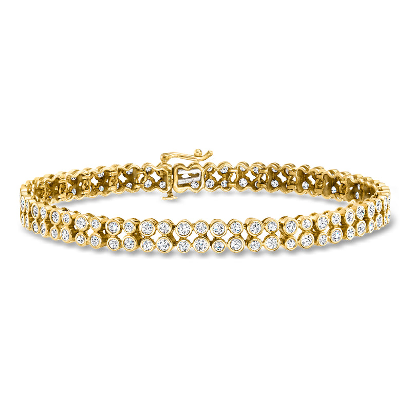 14kt yellow gold two-row tennis bracelet with round bezel-set diamonds
